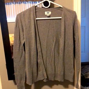 Light gray long sleeve sweater.